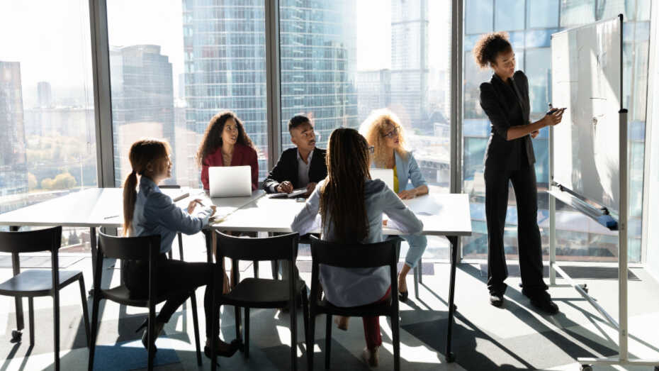 Company meeting taking place in tall building